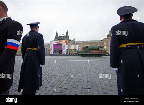 Russian Soldiers In T 14 Armata Battle Tanks March Along The Red Square