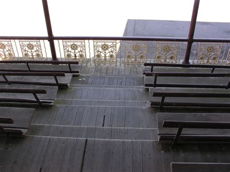 Photograph Grandstand Iron Lace Seats And Floor Grandstand City