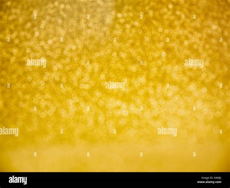 Gold glitter background hi-res stock photography and images - Alamy