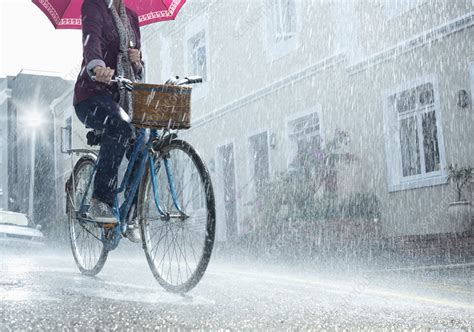 Woman Riding Bicycle With Umbrella Stock Image F014 0459 Science