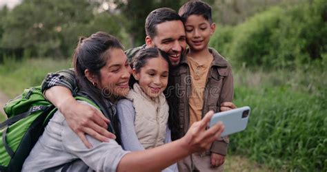 Selfie Happy Kids Or Parents Hiking In Forest To Relax On Holiday