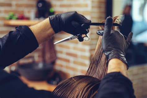 Premium Photo Man Getting Trendy Haircut At Barber Shop