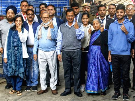 New Delhi : CM Arvind Kejriwal and his family members show their ink ...