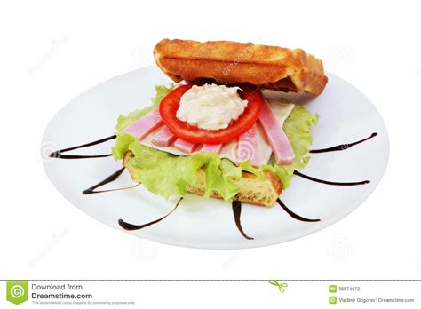 Belgian Waffles Sandwich With Melted Cheese And Ham Stock Photo