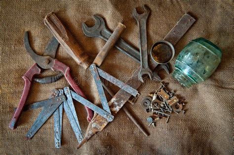 Old Iron Tools On The Background Of Coarse Cloth Stock Photo Image Of