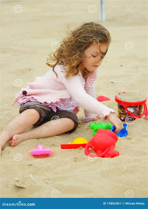 Little Girl Playing In The Sand Stock Image Image 15802461