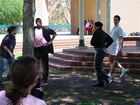 [Four actors gathered at base of pavilion] - UNT Digital Library