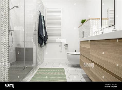 Modern Minimalist Bathroom Interior Design With White Tiles Two White