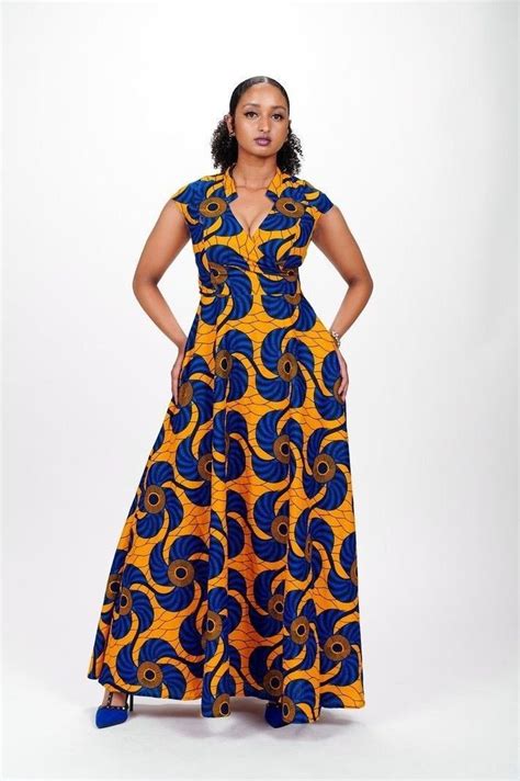 A Woman In A Yellow And Blue Dress