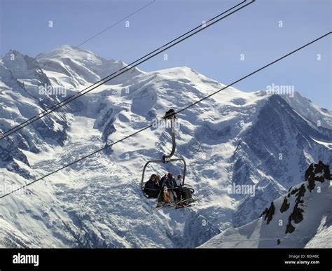 Skiers On Chair Lift Stock Photo Alamy