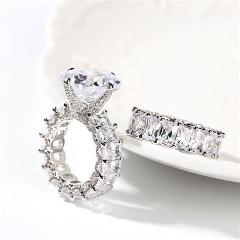 Jeulia Cushion Cut Three Sided Pave Sterling Silver Eternity Ring Set