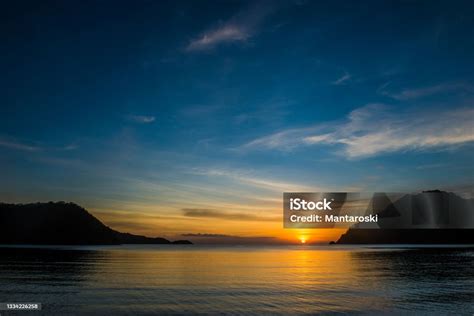 Sunset In Philippines Sea View From Pico De Loro Stock Photo - Download Image Now - Beach, Beach ...