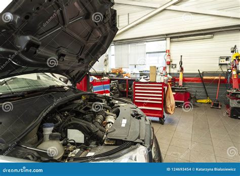 Car Engine During Repair In The Garage With Modern Equipment Overhaul