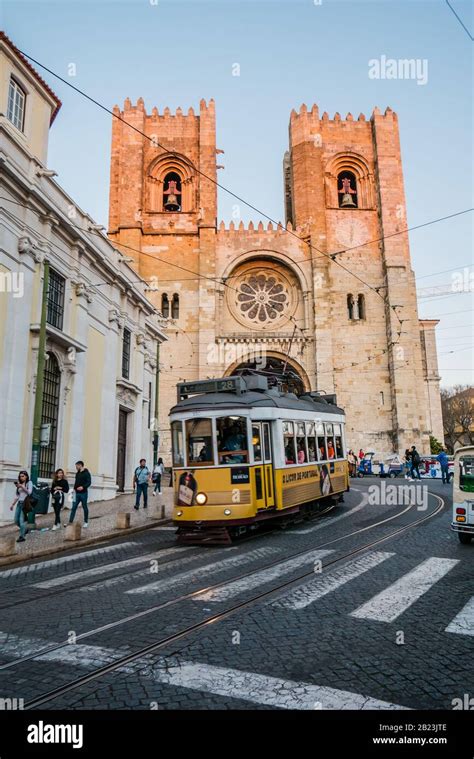 Tram In Front Of The Lisbon Cathedral Santa Maria Maior De Lisboa