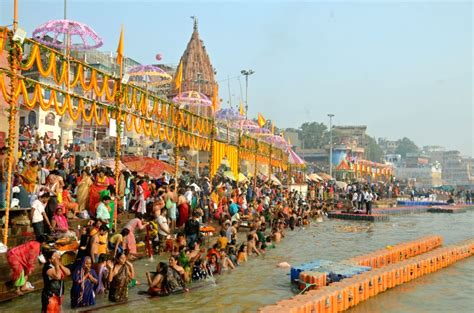 Devotees In Large Numbers Take Holy Dip In River Ganga On The Occasion