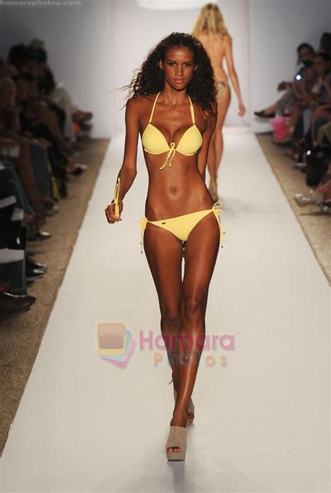 A Model Walks The Runway At The Perfect Tan Bikini Show During