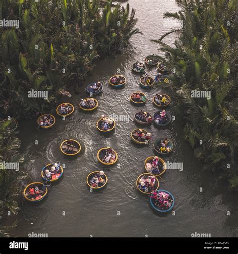 Aerial View Tourists In Basket Boats Tour At The Coconut Water