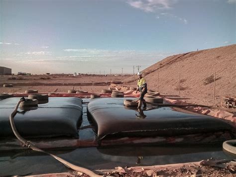 Worker at mine dam sediment removal | Professional Diving Services