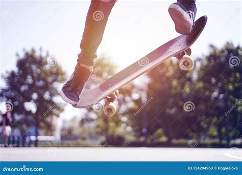 Skateboarder Doing a Trick in a Skate Park, Practice Freestyle Extreme ...