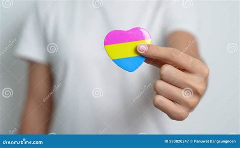 Pansexual Pride Day And Lgbt Pride Month Concept Hand Holding Pink