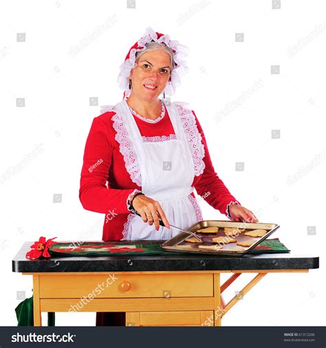 Mrs Claus Baking Christmas Cookies Isolated On White Stock Photo