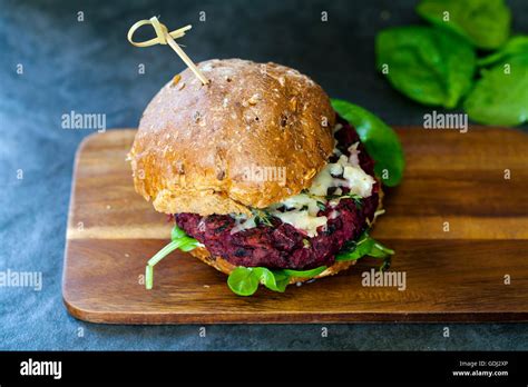 Beetroot And Black Bean Burger With Melted Cheese And Thyme Stock Photo