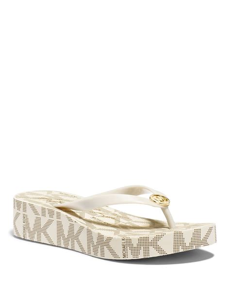 Lyst - Michael Michael Kors Flip Flop Wedge Sandals - Bedford Logo in White