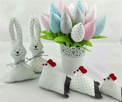 Some Paper Rabbits And Flowers In A Vase