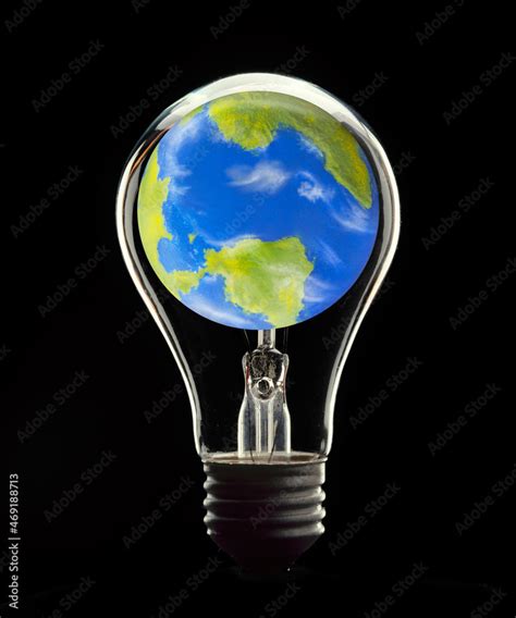 Planet Earth Globe Inside A Bulb Light Lamp On Global Idea Concept