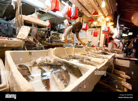 Fishes And Seafood On Display In Shop In Fish Market In Hong Kong Stock