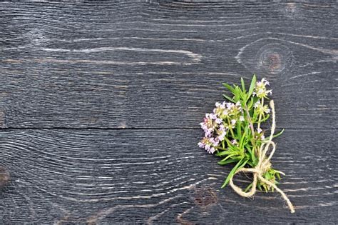 Premium Photo Thyme Leaves And Flowers On Black Board