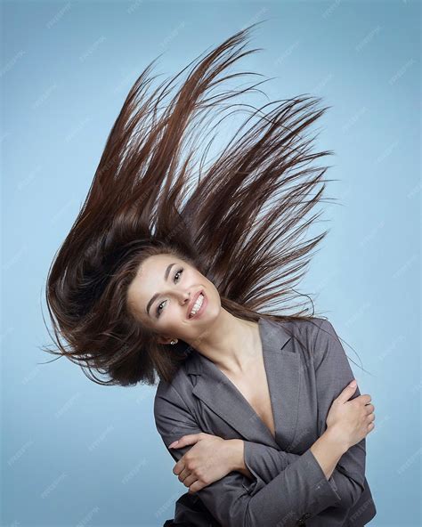 Premium Photo | Girl with flying hair posing