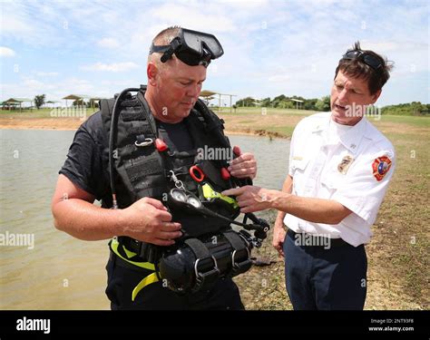 In This June 25 2019 Photo Waco Fire Lt Mike Herbert Left Situates