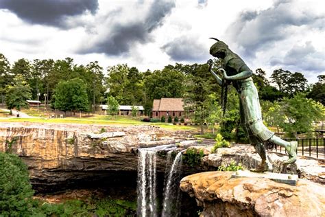 Statue Of Noccalula With The Falls In The Background Horizontal