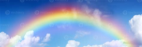 Rainbow on blue sky background, Beautiful rainbow cloudy sky after rain ...