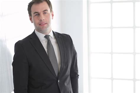 Premium Photo Portrait Of A Confident Mature Businessman Standing Outside