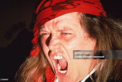 A close up of American comedian Sam Kinison screaming at the Grammy ...