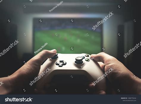 Man Playing On Console Man Holding Stock Photo 1288779244 Shutterstock