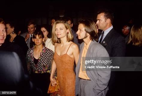 Actors Michelle Pfeiffer and Fisher Stevens attend the premiere of ...