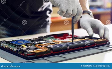 Electronic Master Detach Accumulator Of Laptop In Repair Workshop On