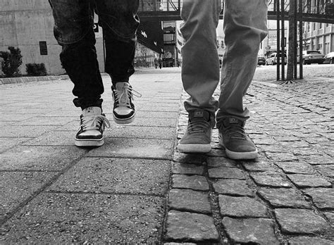 Royalty Free Photo Grayscale Photo Of Two Persons Wearing Sneakers