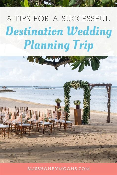 An Outdoor Wedding Setup With Chairs And Flowers On The Beach