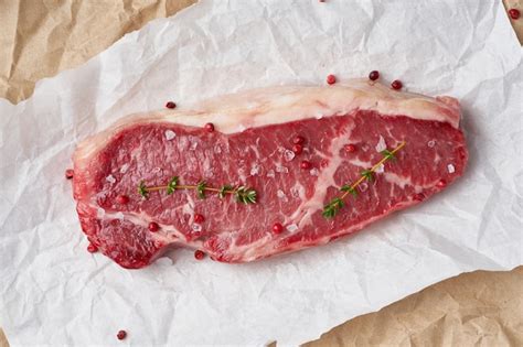 Premium Photo Big Whole Piece Of Raw Beef Meat Striploin On White