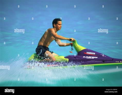 Action Man Riding Jet Ski Stock Photo Alamy