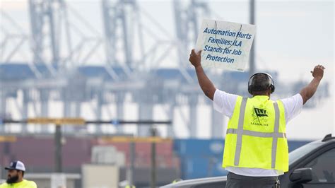 port strike suspended  dockworkers union receives  wage offer