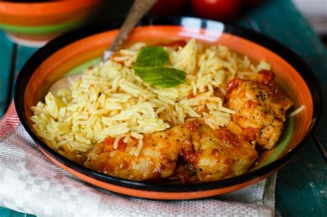 Free Photo Traditional Indian Dish With Rice And Chicken Close Up