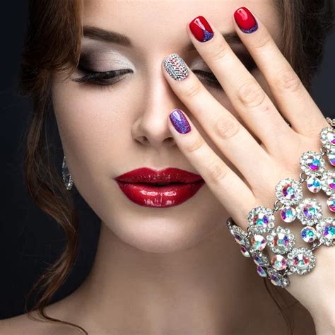 Beautiful Girl With A Bright Evening Make Up And Pink Manicure With