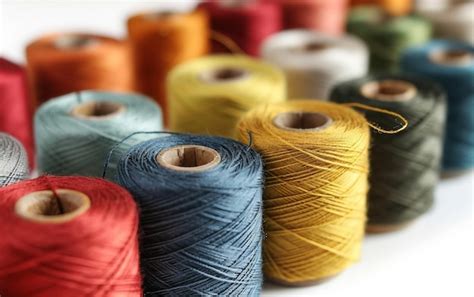 Premium Photo Colorful Sewing Thread Arrangement