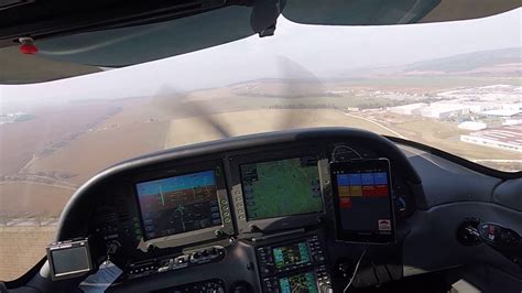 Cirrus SR22 Landing on Grass Strip LKRK - YouTube