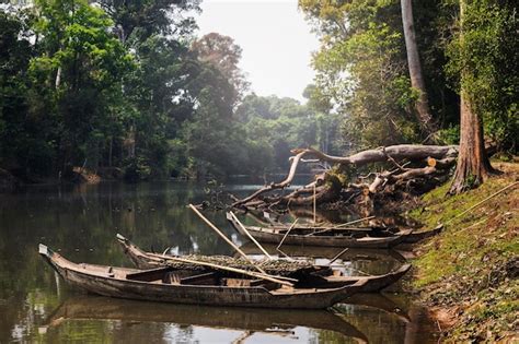 Premium Photo | Khmer fishing boats on the river in cambodia